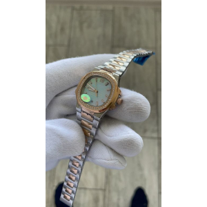 Patek Philippe Nautilus Lady (код 387) Patek Philippe Nautilus Lady (код 387)