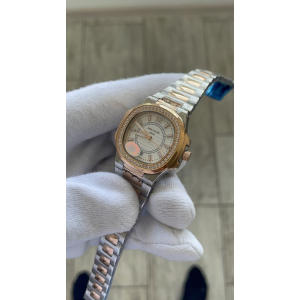 Patek Philippe Nautilus Lady (код 388) Patek Philippe Nautilus Lady (код 388)