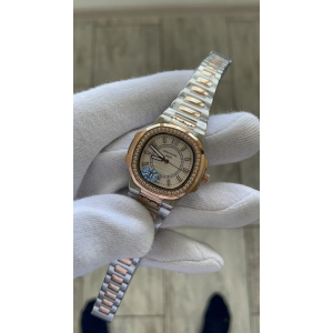 Patek Philippe Nautilus Lady (код 388) Patek Philippe Nautilus Lady (код 388)